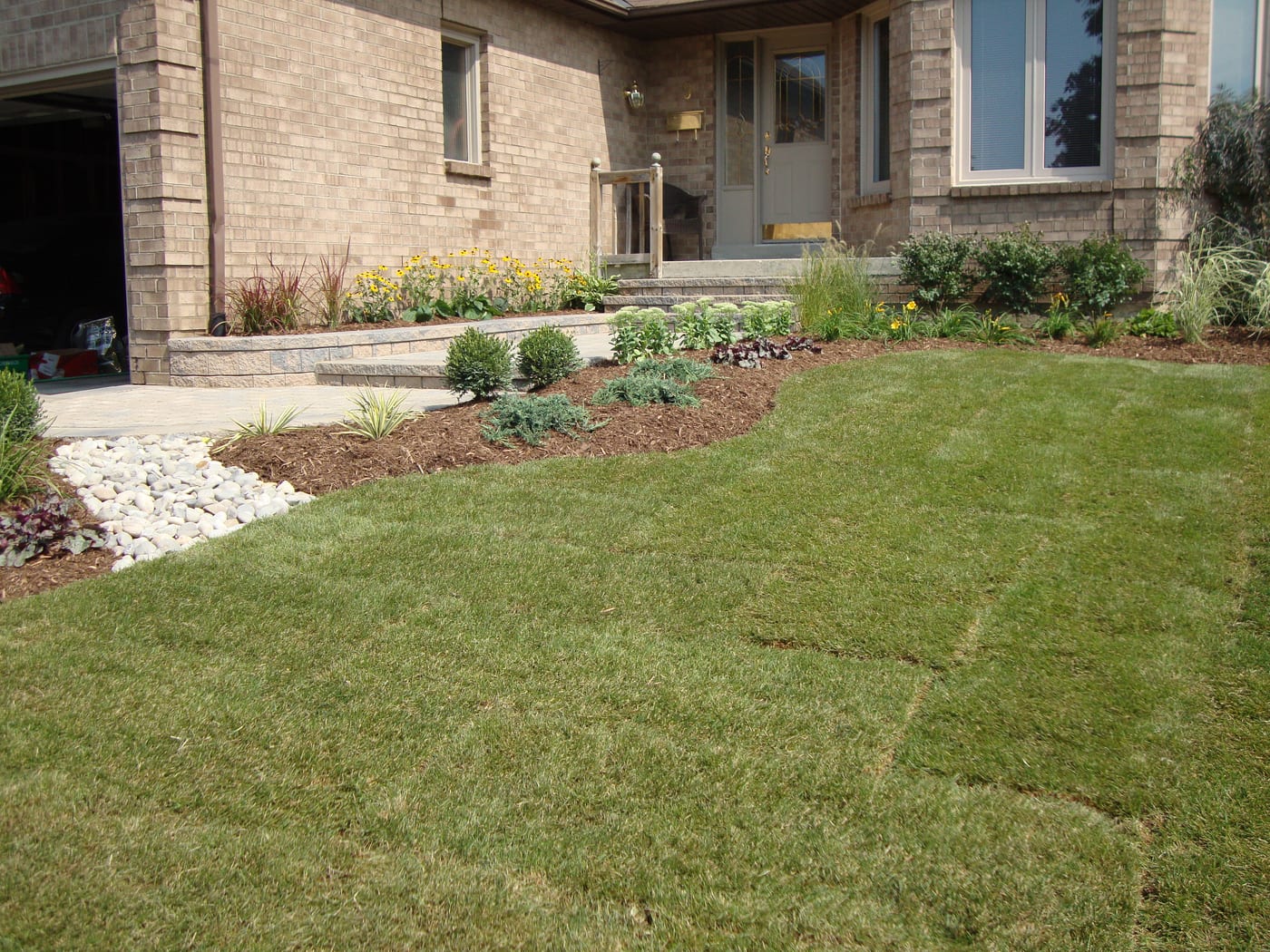 Stone walkway and steps leading to the front entrance