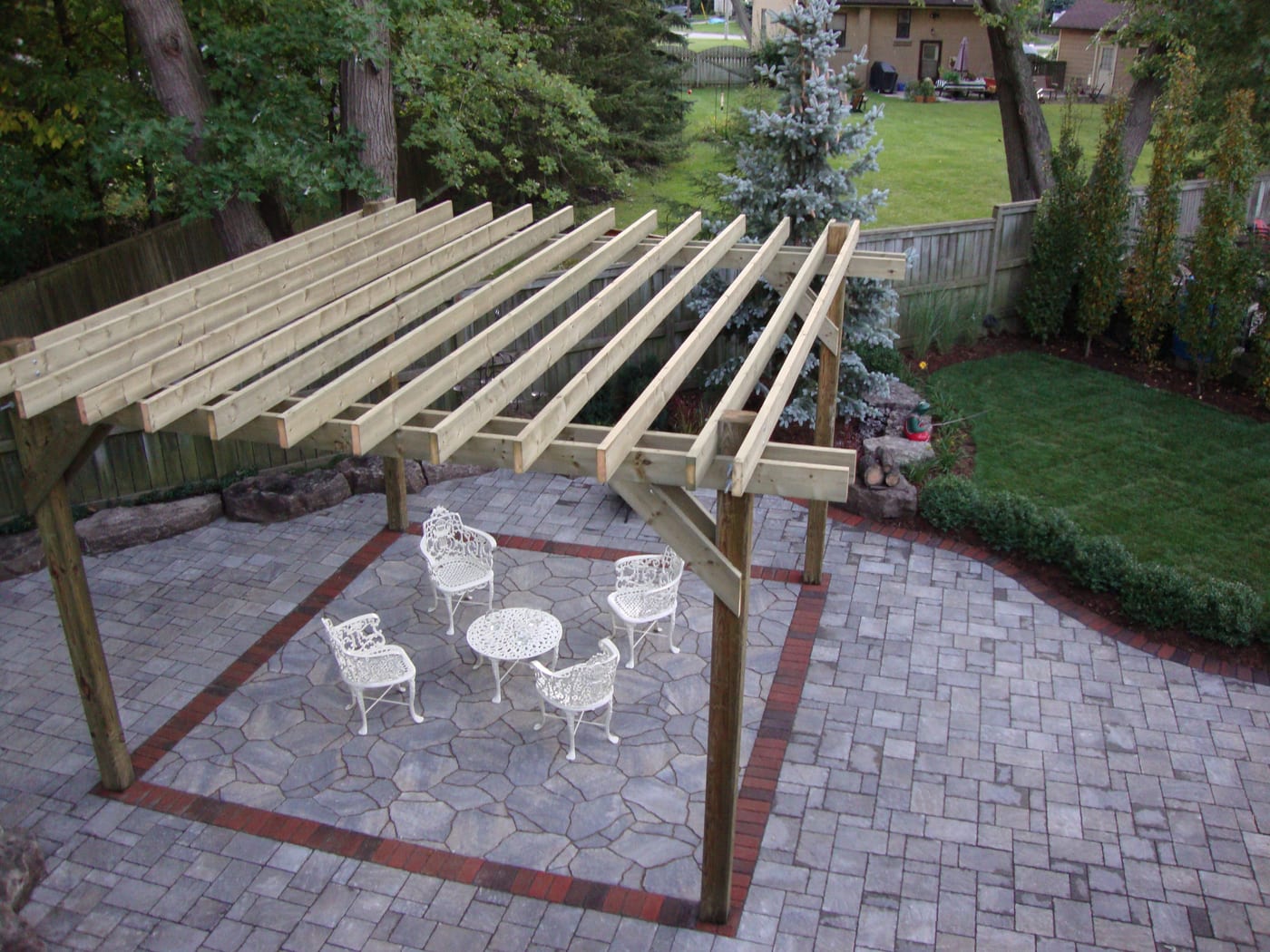 Finished backyard lawn and stone patio